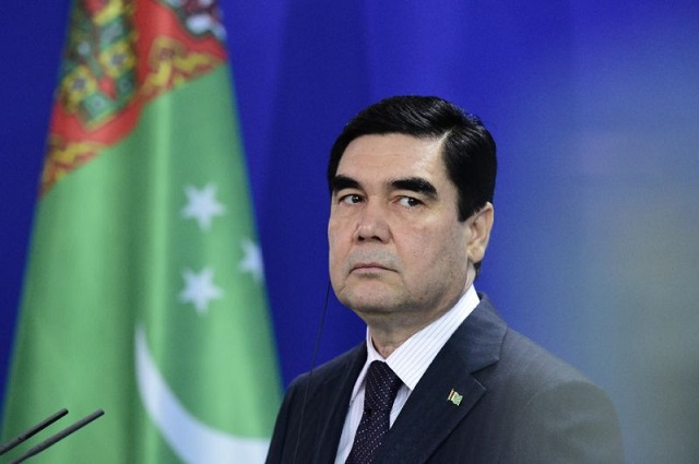 a photograph of gurbanguly berdymukhamedov shows his thick dark mane flecked with grey for the first time photo afp file