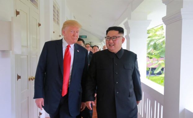 us president donald trump walks with north korean leader kim jong un at the capella hotel on sentosa island in singapore photo reuters