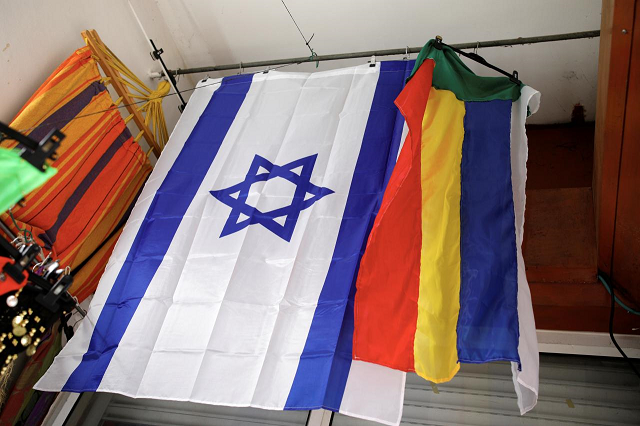an israeli and a druze flag hang from the ceiling of a store in the druze town of daliat al karmel northern israel august 2 2018 photo reuters an israeli and a druze flag hang from the ceiling of a store in the druze town of daliat al karmel northern israel august 2 2018 photo reuters