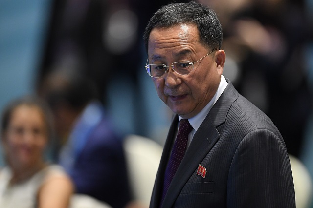 north korea 039 s foreign minister ri yong ho arrives for a group photo at the asean regional forum retreat during the 51st association of southeast asian nations asean ministerial meeting amm in singapore on august 4 2018 photo afp