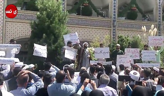 n this video grab made from a video by nasim news agency a cleric speaks to a crowd of protesters demonstrating in mashhad in the khorasan razavi province on august 3 2018 photo afp