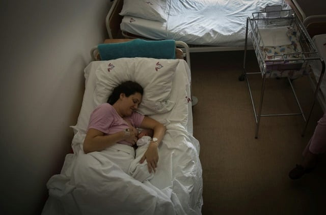 aleksandra milenovic 31 breastfeeds her day old baby milica at a belgrade maternity hospital photo afp aleksandra milenovic 31 breastfeeds her day old baby milica at a belgrade maternity hospital photo afp