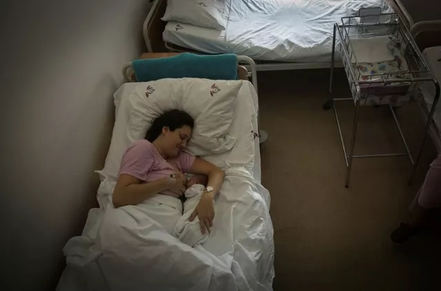 aleksandra milenovic 31 breastfeeds her day old baby milica at a belgrade maternity hospital photo afp aleksandra milenovic 31 breastfeeds her day old baby milica at a belgrade maternity hospital photo afp