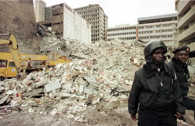 in this file photo taken on august 8 1998 kenyan security guards keep watch over the scene of the bomb explosion the day before near the us embassy in nairobi kenya and tanzania on tuesday mark 20 years since devastating us embassy bombings that thrust al qaeda onto the global stage and went on to shape how a generation thinks about personal security it was mid morning on august 7 1998 when a first massive blast hit the us embassy in downtown nairobi followed minutes later by an explosion in dar es salaam killing a total of 224 people and injuring around 5 000 almost all of them africans photo afp in this file photo taken on august 8 1998 kenyan security guards keep watch over the scene of the bomb explosion the day before near the us embassy in nairobi kenya and tanzania on tuesday mark 20 years since devastating us embassy bombings that thrust al qaeda onto the global stage and went on to shape how a generation thinks about personal security it was mid morning on august 7 1998 when a first massive blast hit the us embassy in downtown nairobi followed minutes later by an explosion in dar es salaam killing a total of 224 people and injuring around 5 000 almost all of them africans photo afp