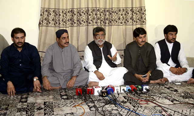 pakistan tehreek e insaf balochistan chapter president yar muhammad rind and independent candidate naimatullah zehri address a press conference photo express
