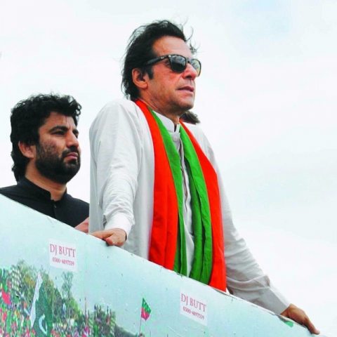 pakistan tehreek e insaf pti balochistan chapter general secretary qasim khan suri stands behind pti chief imran khan photo qasim khan suri pakistan tehreek e insaf pti balochistan chapter general secretary qasim khan suri stands behind pti chief imran khan photo qasim khan suri