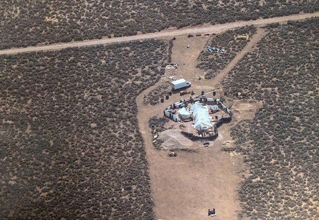 this undated handout photo released by the taos county sheriff 039 s office on august 4 2018 shows a view of the compound in amalia new mexico where police rescued 11 children and arrested two armed quot extremists quot police say 11 children ages one to 15 were rescued in the us state of new mexico after officers raided on august 3 a makeshift compound occupied by armed quot extremists quot two men were arrested after police found them and the children in what one officer called quot the saddest living conditions and poverty i have seen quot as part of the operation connected to a months long search for an abducted three year old according to new mexico 039 s taos county sheriff 039 s office photo afp