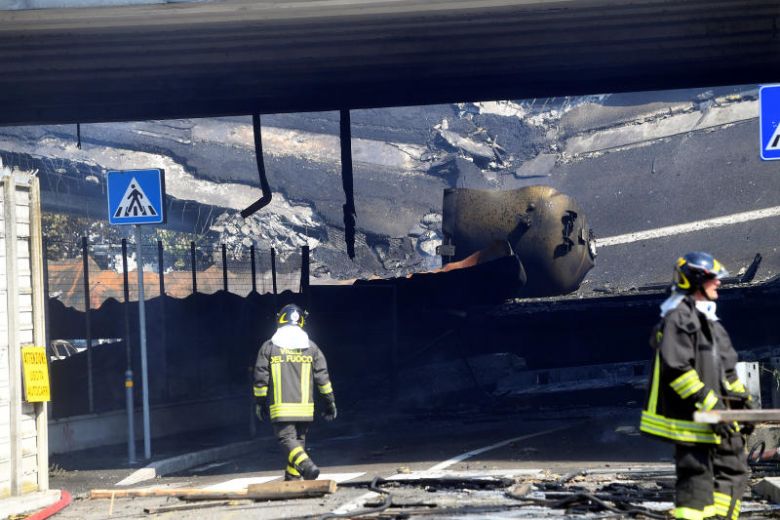 firefighters work near the motorway after an accident caused a large explosion and fire at borgo panigale on the outskirts of bologna italy on aug 6 2018 photo reuters