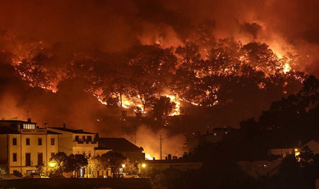 wildfire rages as portugal deals with 46c heat photo courtesy express co uk