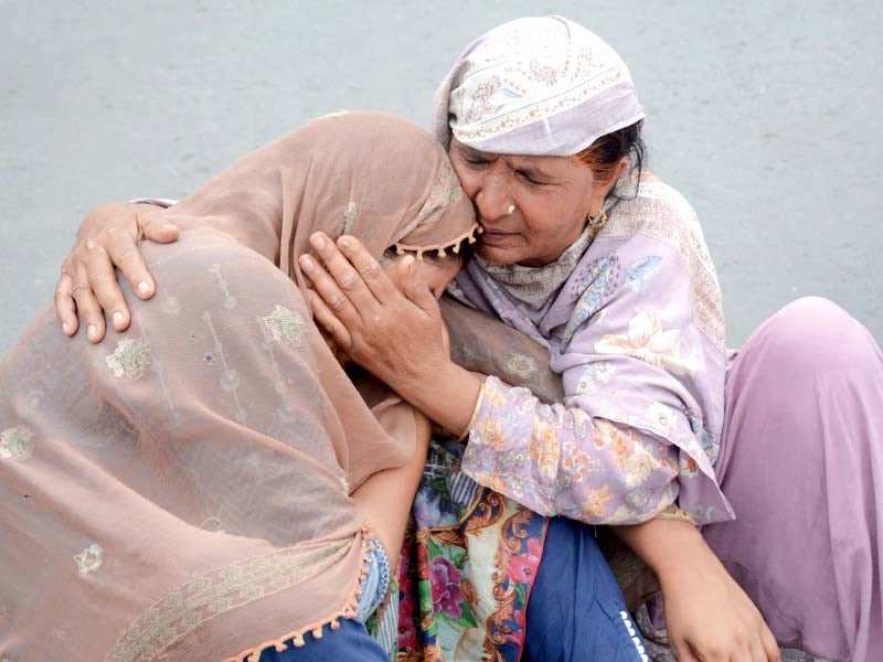 mourning relatives of the deceased stage a protest demonstration at faisal chowk photo online