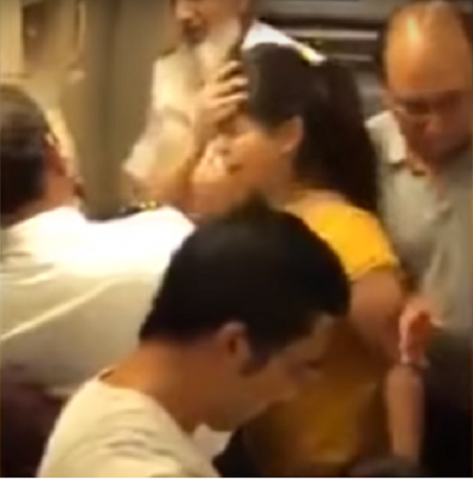 a distressed passenger demands staff open the doors to the plane screengrab a distressed passenger demands staff open the doors to the plane screengrab