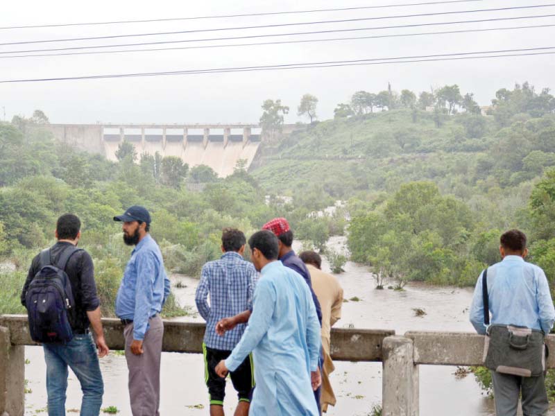 visitors at rawal dam photo file