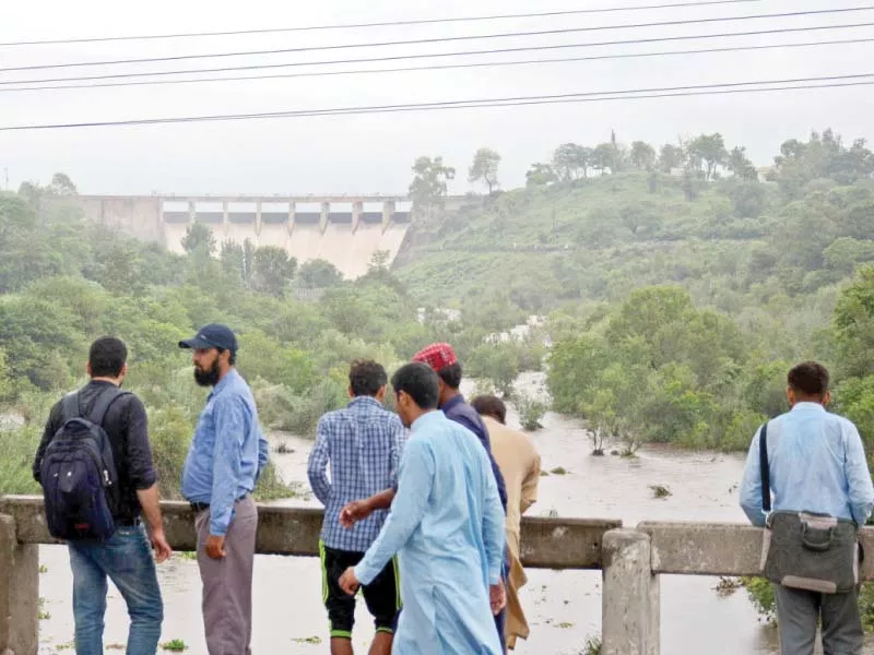 visitors at rawal dam photo file visitors at rawal dam photo file