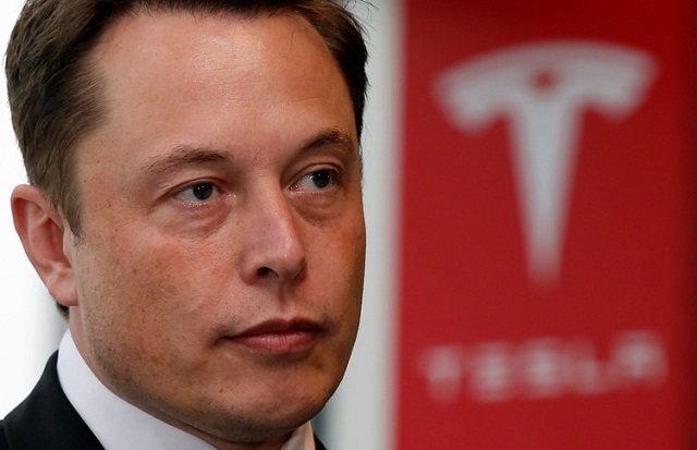 tesla chief executive elon musk pauses during a news conference in tokyo september 8 2014 photo reuters