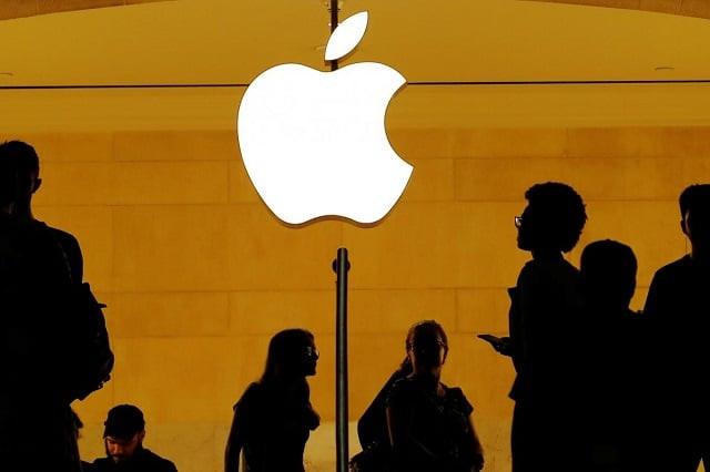 customers walk past an apple logo inside of an apple store at grand central station in new york us august 1 2018 photo reuters
