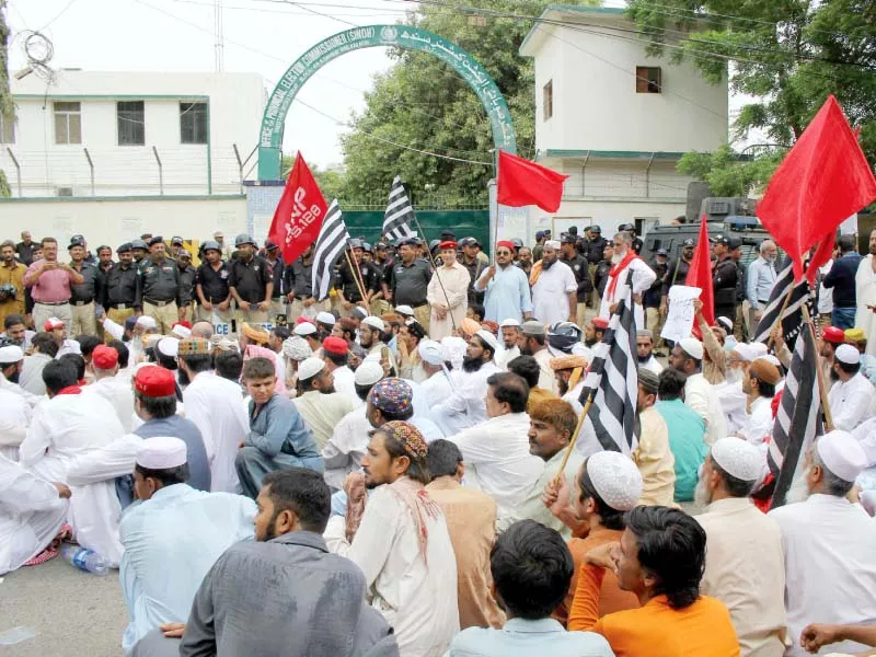 workers of various political parties staged a protest against massive rigging in front of the election commission s office causing a severe traffic jam in saddar photo athar khan express workers of various political parties staged a protest against massive rigging in front of the election commission s office causing a severe traffic jam in saddar photo athar khan express