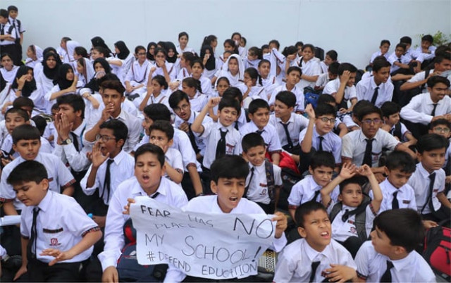 students of a private school protest against sealing of their school photo online students of a private school protest against sealing of their school photo online