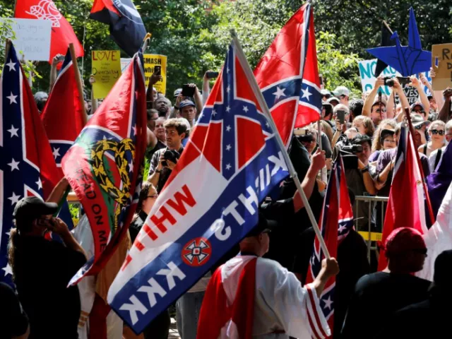 members of the white supremacist ku klux klan face counter protests in charlottesville virginia u s on july 8 2017 photo reuters members of the white supremacist ku klux klan face counter protests in charlottesville virginia u s on july 8 2017 photo reuters