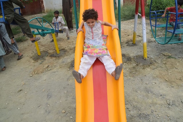 children playing in a school park in mohmand agency photo express