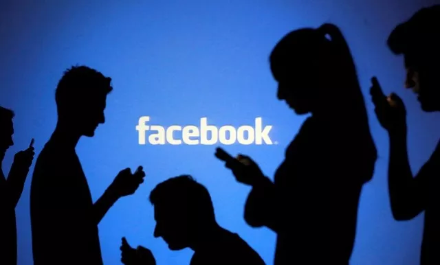 people are silhouetted as they pose with mobile devices in front of a screen projected with a facebook logo in this picture illustration taken in zenica october 29 2014 photo reuters people are silhouetted as they pose with mobile devices in front of a screen projected with a facebook logo in this picture illustration taken in zenica october 29 2014 photo reuters