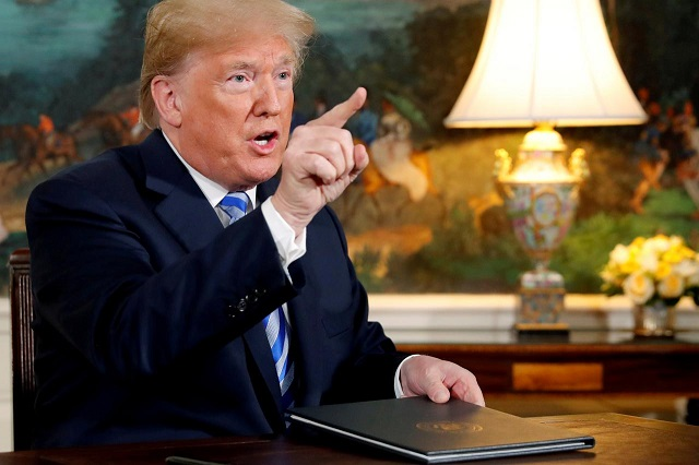 us president donald trump speaks to reporters after signing a proclamation declaring his intention to withdraw from the jcpoa iran nuclear agreement in the diplomatic room at the white house in washington u s may 8 2018 photo reuters