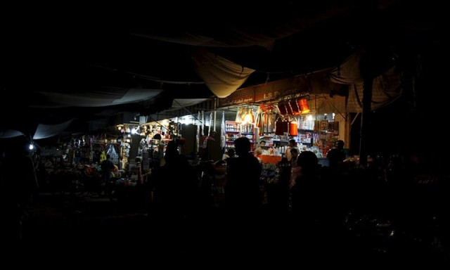 a file photo of karachi experiencing power breakdown photo reuters a file photo of karachi experiencing power breakdown photo reuters