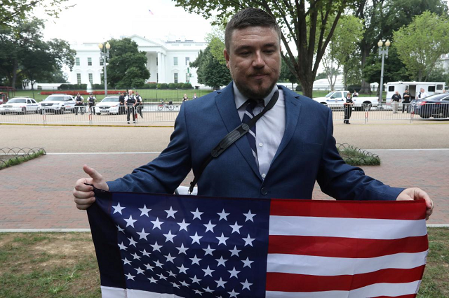 white nationalist leader jason kessler holds a flag across from the white house during a rally marking the one year anniversary of the 2017 charlottesville 039 unite the right 039 protests in washington d c august 12 2018 photo reuters white nationalist leader jason kessler holds a flag across from the white house during a rally marking the one year anniversary of the 2017 charlottesville 039 unite the right 039 protests in washington d c august 12 2018 photo reuters