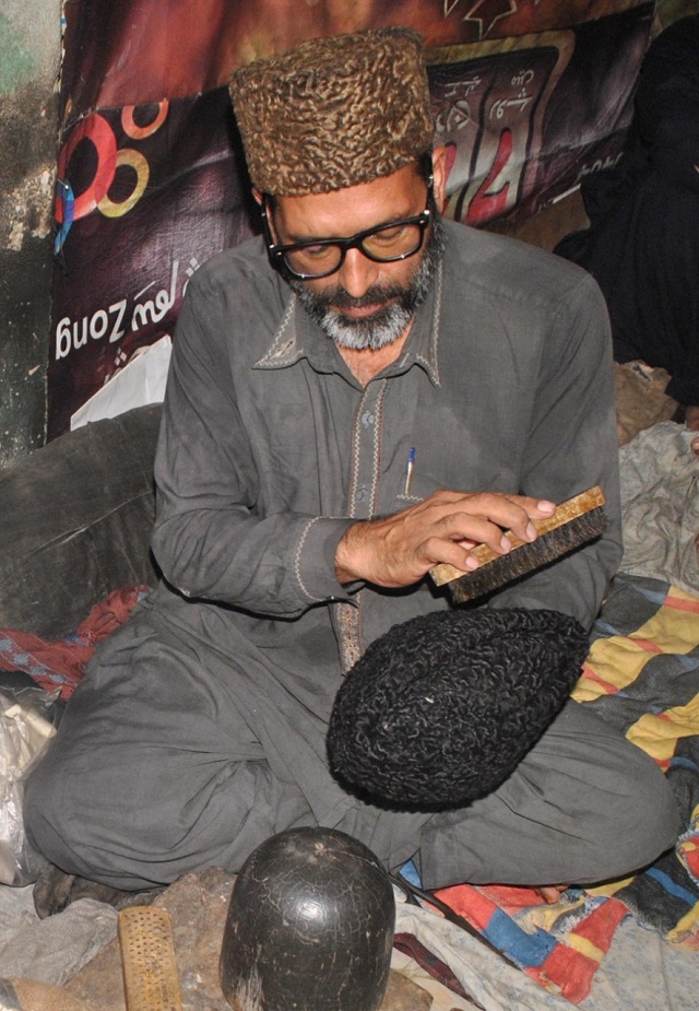 abbas followed in the footsteps of his forefathers who had the honour of dressing the heads of former prime ministers presidents and other political notables ali who lives in a small house in downtown multan knits these caps in the same building to make a living photo express