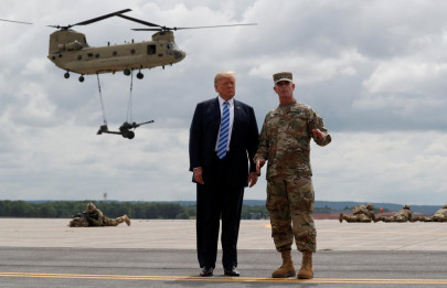 trump signs defense policy bill with watered down china measures trump signs defense policy bill with watered down china measures