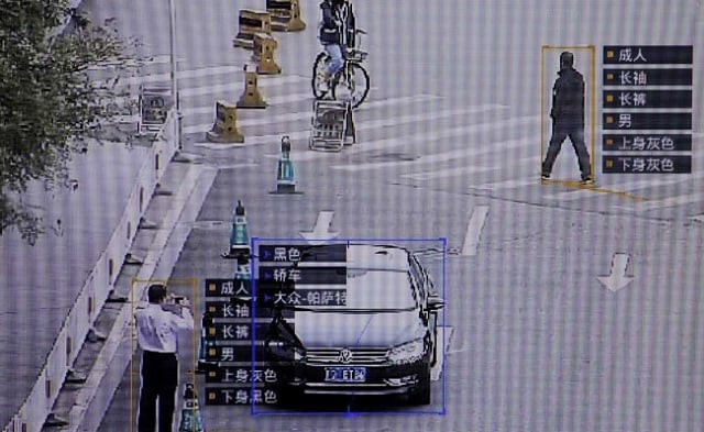 sensetime surveillance software identifying details about people and vehicles runs as a demonstration at the company 039 s office in beijing china october 11 2017 photo reuters sensetime surveillance software identifying details about people and vehicles runs as a demonstration at the company 039 s office in beijing china october 11 2017 photo reuters