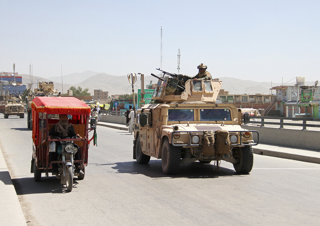 afghan security forces convoy patrols the streets after a taliban attack photo reuters