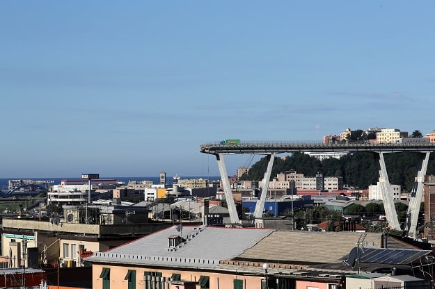 the collapsed morandi bridge is seen in the italian port city of genoa italy photo reuters