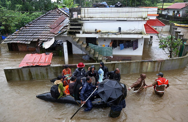 some 353 000 people have taken shelter in 3 026 relief camps as thousands of army navy and air force troops fan out to help those still stranded photo reuters