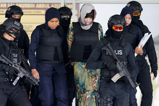 vietnamese doan thi huong who is on trial for the killing of kim jong nam the estranged half brother of north korea 039 s leader is escorted as she leaves the shah alam high court on the outskirts of kuala lumpur malaysia august 16 2018 photo reuters vietnamese doan thi huong who is on trial for the killing of kim jong nam the estranged half brother of north korea 039 s leader is escorted as she leaves the shah alam high court on the outskirts of kuala lumpur malaysia august 16 2018 photo reuters
