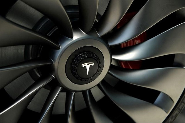 a wheel of a prototype of the tesla model 3 on display in front of the factory during a media tour of the tesla gigafactory which will produce batteries for the electric carmaker in sparks nevada us july 26 2016 photo reuters a wheel of a prototype of the tesla model 3 on display in front of the factory during a media tour of the tesla gigafactory which will produce batteries for the electric carmaker in sparks nevada us july 26 2016 photo reuters