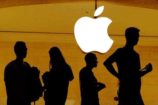 customers walk past an apple logo inside of an apple store at grand central station in new york us august 1 2018 photo reuters customers walk past an apple logo inside of an apple store at grand central station in new york us august 1 2018 photo reuters