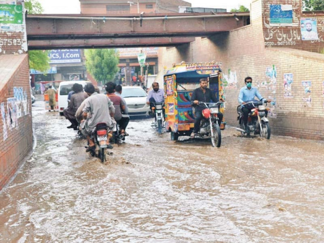 rainwater accumulated at an underpass in ry khan photo express rainwater accumulated at an underpass in ry khan photo express