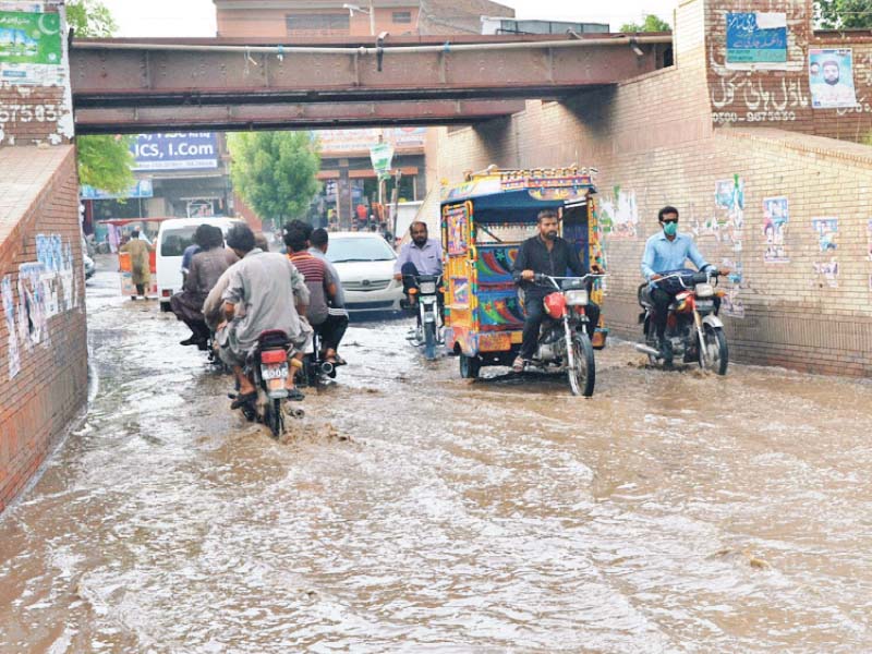 rainwater accumulated at an underpass in ry khan photo express