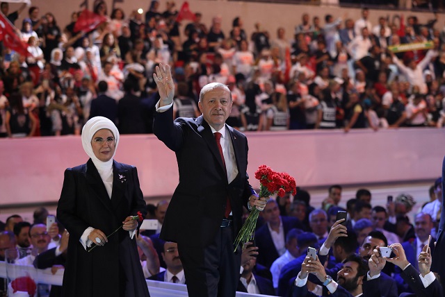 turkish president recep tayyip erdogan r and his wife emine erdogan l greet supporters of the ruling justice and development party akp photo afp