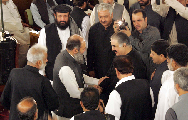 former chief minister sanaullah zehri congratulates jam kamal khan on being elected as the provincial chief in the balochistan assembly photo express