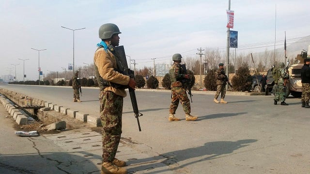 afghan security forces keep watch at the site of an attack in kabul afghanistan december 18 2017 photo reuters