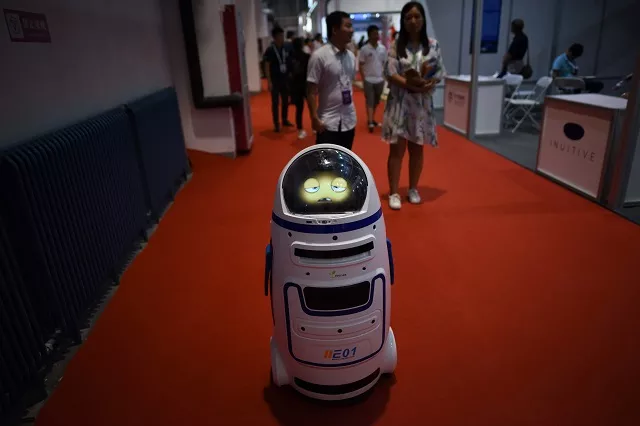files this file photo taken on august 15 2018 shows a robot moving at the 2018 world robot conference in beijing the popular stars of this year 039 s world robot conference which ends on august 19 2018 were undoubtedly the small amateur made quot battle bots quot which smashed hammered and sawed their way through their opponents to a cacophony of cheers and shouts from a rapt audience photo afp files this file photo taken on august 15 2018 shows a robot moving at the 2018 world robot conference in beijing the popular stars of this year 039 s world robot conference which ends on august 19 2018 were undoubtedly the small amateur made quot battle bots quot which smashed hammered and sawed their way through their opponents to a cacophony of cheers and shouts from a rapt audience photo afp