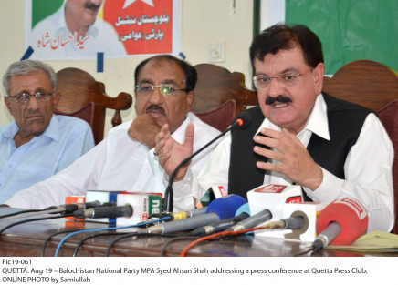 balochistan national party awami acting president syed ahsan shah addresses a press conference at the quetta press club photo express