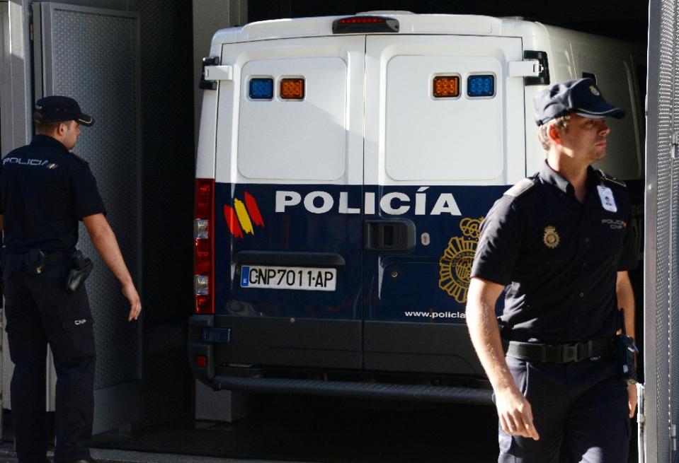 spanish police shoots a man trying to attack police station armed with a knife photo afp