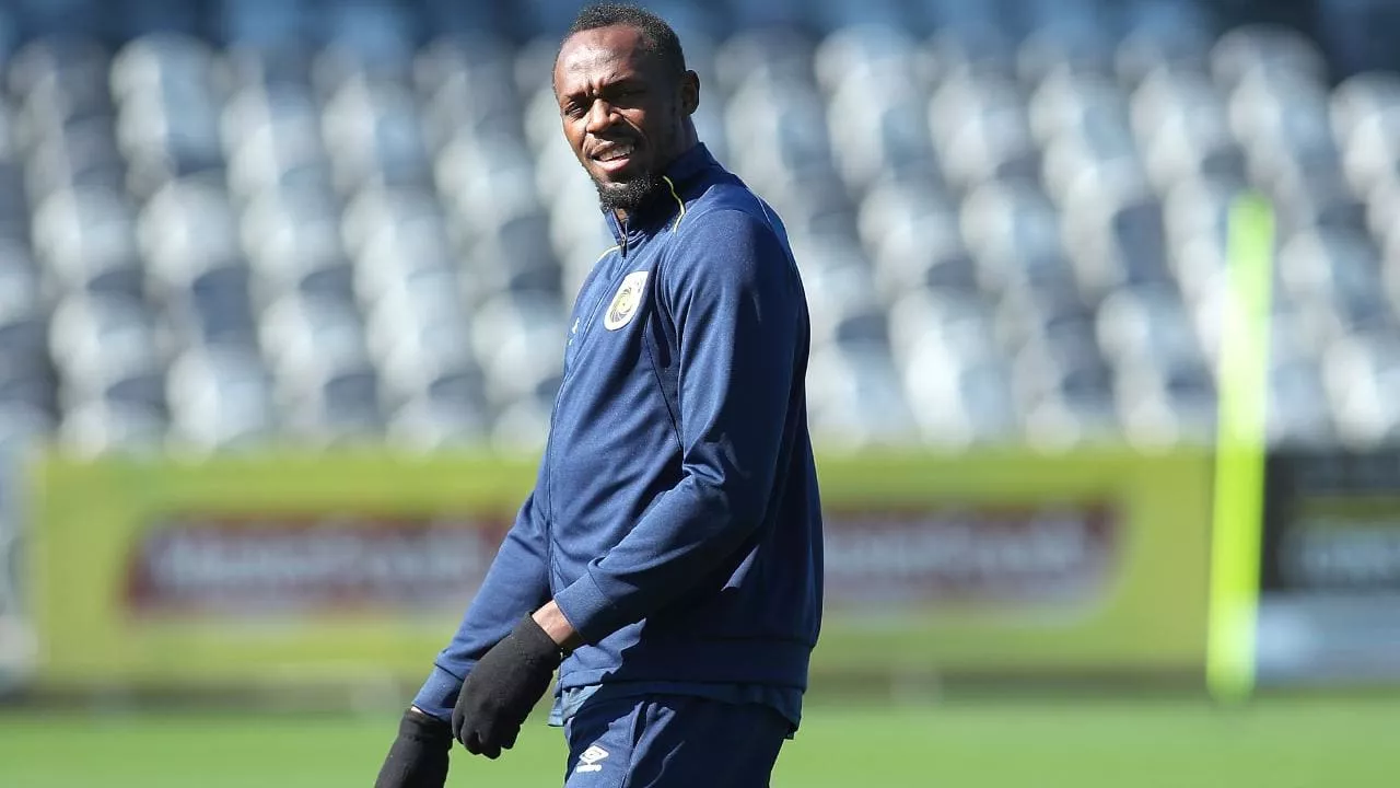 sprint king vows to work hard in order to become professional footballer photo afp sprint king vows to work hard in order to become professional footballer photo afp