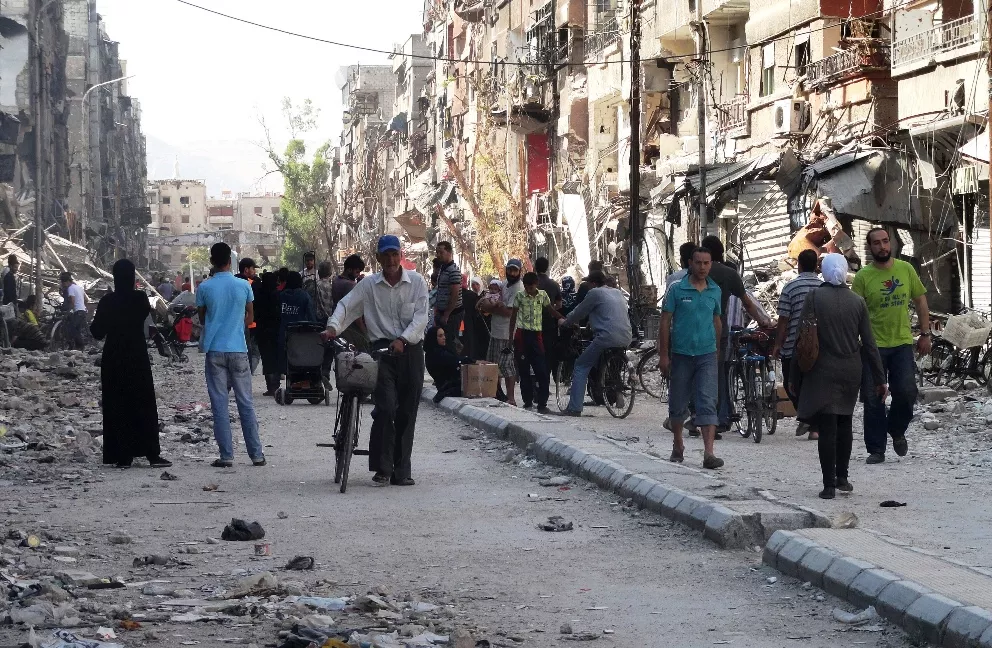 residents of syria 039 s yarmuk palestinian refugee camp photo afp residents of syria 039 s yarmuk palestinian refugee camp photo afp