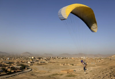 a bit dangerous afghan paraglider who braves conflict to train