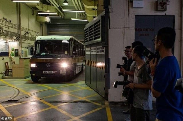 a prison van transporting khaw kim sun who is accused of murdering his wife and daughter leaves the high court in hong kong on august 23 2018 photo afp a prison van transporting khaw kim sun who is accused of murdering his wife and daughter leaves the high court in hong kong on august 23 2018 photo afp