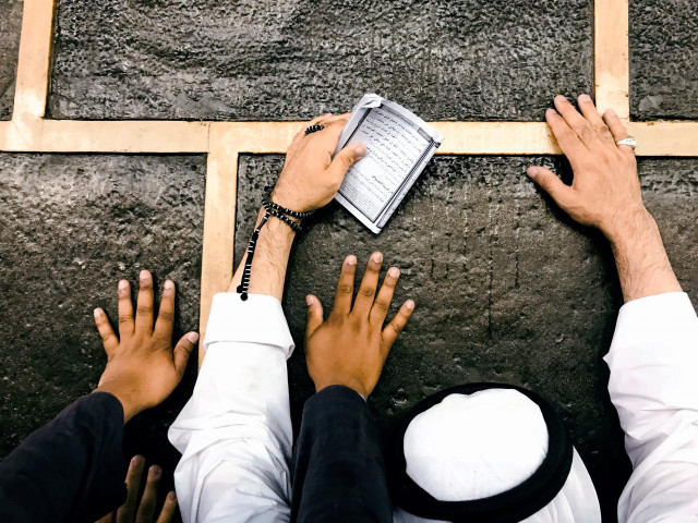 muslim pilgrims kiss and touch the wall of the kaaba as they perform tawaf al ifada during the annual haj pilgrimage at the grand mosque in the holy city of mecca saudi arabia august 23 2018 photo reuters muslim pilgrims kiss and touch the wall of the kaaba as they perform tawaf al ifada during the annual haj pilgrimage at the grand mosque in the holy city of mecca saudi arabia august 23 2018 photo reuters