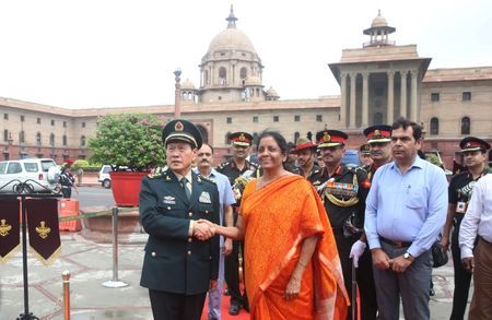 china 039 s defense minister wei fenghe shakes hands with his indian counterpart nirmala sitharaman before their meeting in new delhi photo reuters